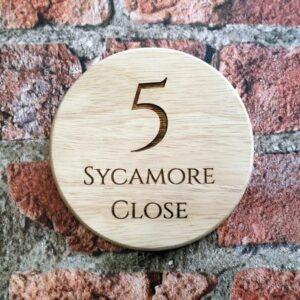wooden house number sign 